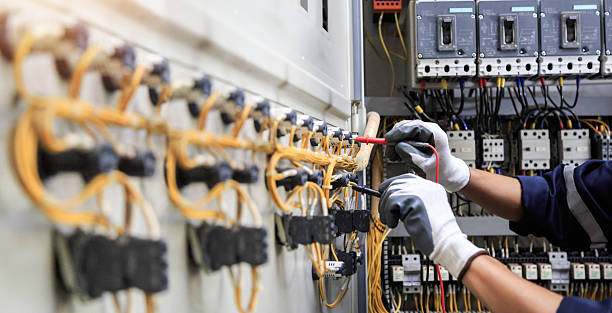 Professional Electrician technician working in Belton, MO